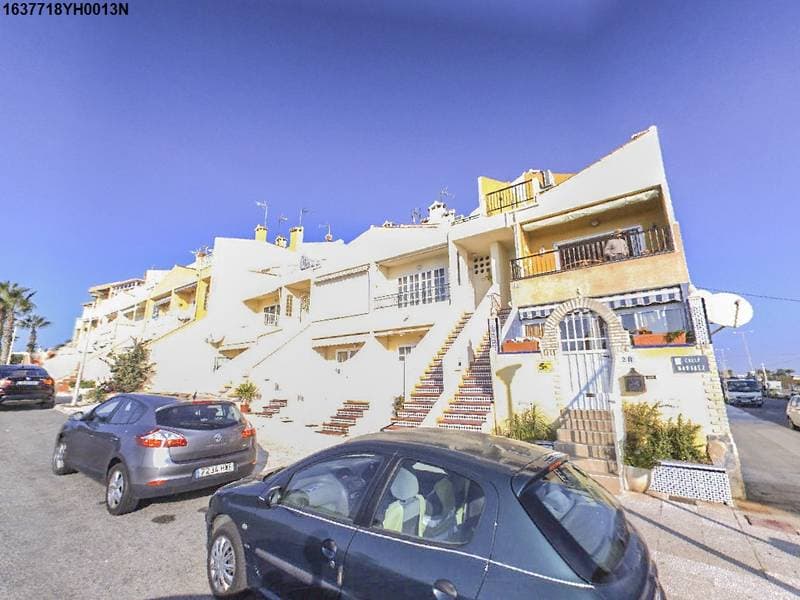 100,00% de Propiedad plena de URBANA.- UNO.- En término de Torrevieja, campo de Salinas, partido de la Rambla, y comprendida en el Convenio Número Seis, parte del Residencial Eliseos Playa, manzana veintiuna, parte de la la parcela número Tres, del C - Imagen 1
