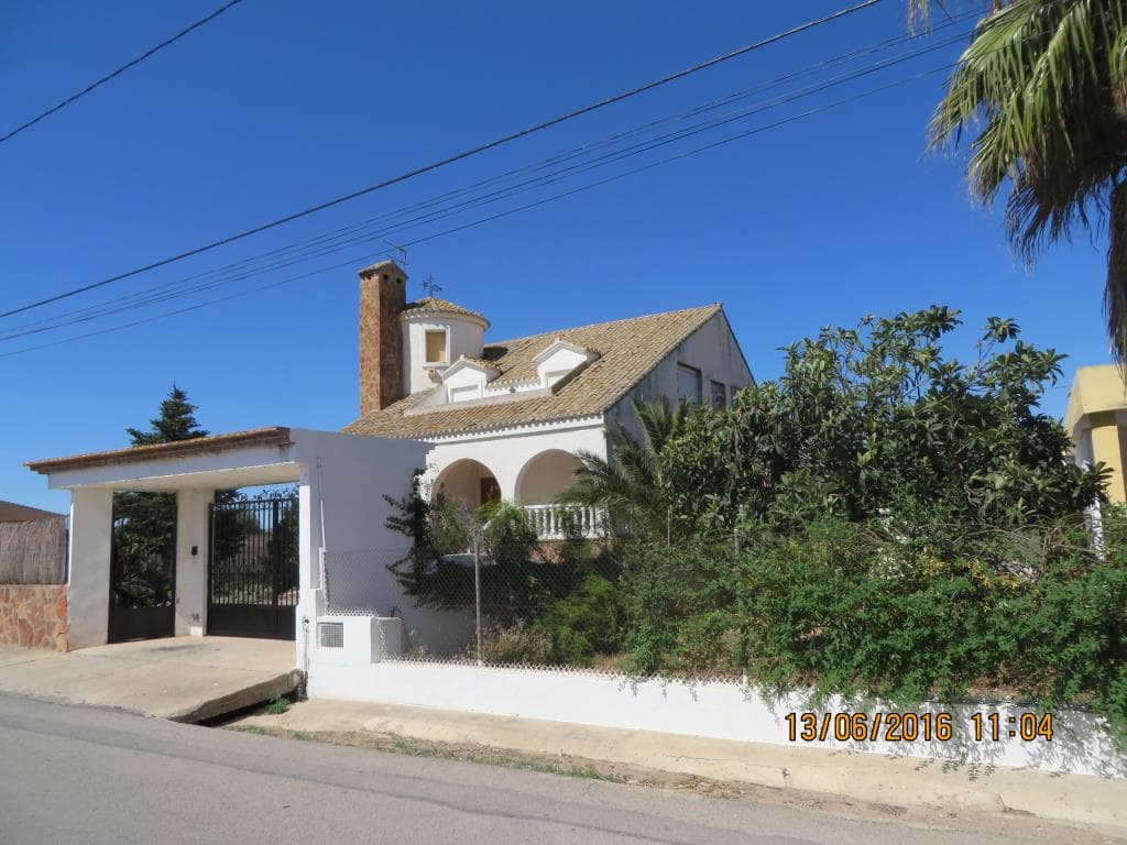 Casa unifamiliar situada en Torrent, calle Mas del Jutge número treinta y uno-F. - Imagen 1