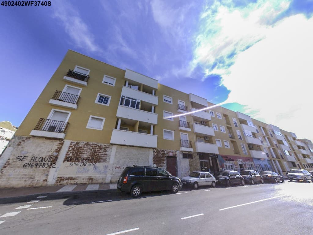 : URBANA. SETENTA Y SIETE. LOCAL COMERCIAL denominado 5, sin uso específico y susceptible de división, situado en parte de la planta baja del Bloque B de un Conjunto de edificación, sito entre las calles La Coruña y Orense, en término de Roquetas de - Imagen 1