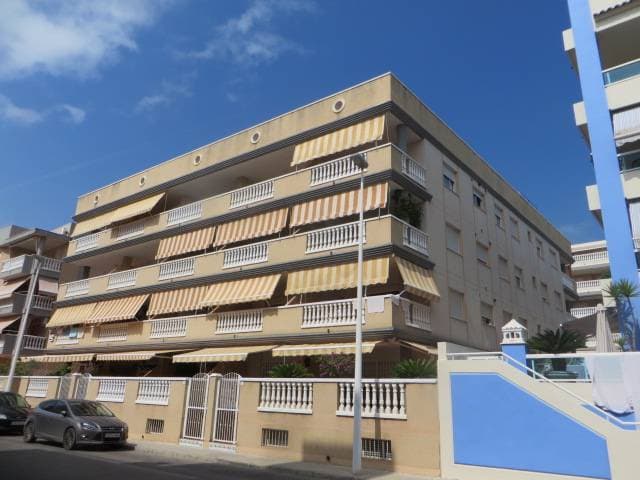 LOTE ÚNICO: URBANA. UNIDAD NUMERO CINCUENTA Y OCHO: VIVIENDA señalada con la letra B) de la PLANTA BAJA, del edificio sito en Moncofar, calle Torrecaida sin número. Ubicada entre la vivienda A) y c) mirando al edificio desde la calle Torrecaida, con - Imagen 1