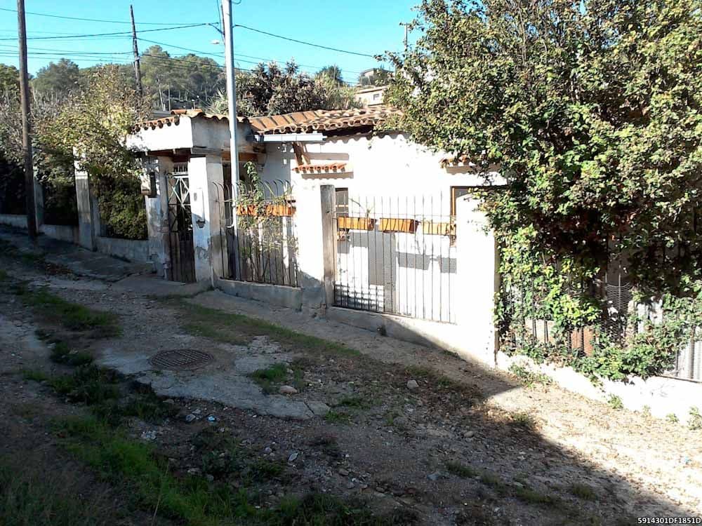 DESCRIPCIÓN: VIVIENDA UNIFAMILIAR sita en Sant Vicenç dels Horts, con frente principal al Camino de Can Ribazo, donde le corresponde el número uno, chaflán a la carretera de Torrellas, sin número. Se compone de sólo planta baja con una superficie de - Imagen 1