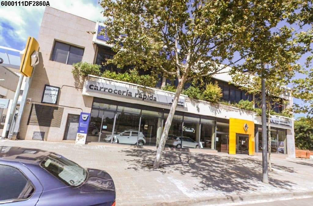 Local destinado a aparcamiento de vehículos ; participación indivisa 0,706% correspondiente a plaza de aparcamiento núm. 97