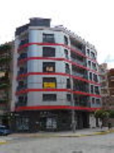 100,00% de Propiedad plena de URBANA: Catorce.- LOCAL terminado situado en la planta sótano del EDIFICIO, sito en Denia, con frente a la calle Diana número 41, en el chaflán con el Passeig del Saladar, donde le corresponde el número 2: finca registra - Imagen 1